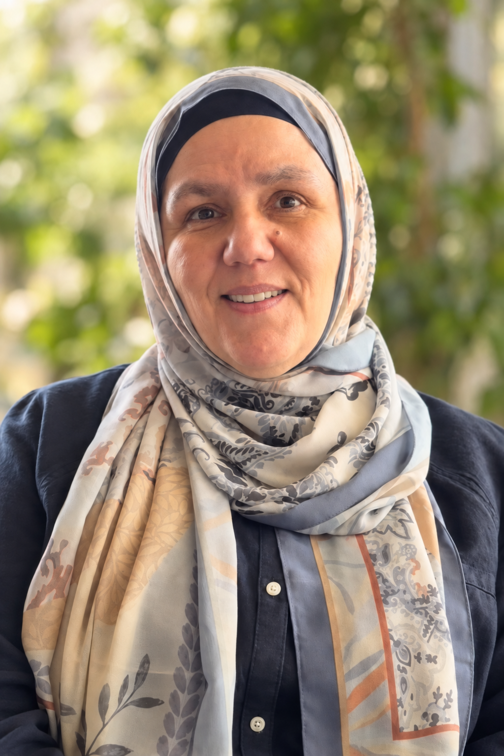 Laila Hassaballa smiling outdoors